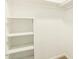 Walk-in closet offers shelving units and ample storage space at 3554 W Aire Libre Ave, Phoenix, AZ 85053