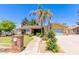 Charming single-Gathering home featuring mature trees and a welcoming walkway to the front door at 3554 W Aire Libre Ave, Phoenix, AZ 85053