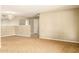 Spacious living room featuring neutral walls and carpeted floors at 3554 W Aire Libre Ave, Phoenix, AZ 85053