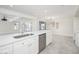 Bright, updated kitchen features sleek countertops, stainless steel appliances, and a peninsula island at 3824 W Carol Ave, Phoenix, AZ 85051