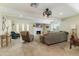 Inviting living room featuring a cozy fireplace, neutral tones, and stylish decor for comfortable living at 3824 W Carol Ave, Phoenix, AZ 85051