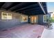 Large brick patio with exterior access to backyard oasis, perfect for entertaining at 3824 W Carol Ave, Phoenix, AZ 85051