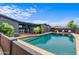 Backyard pool with bar, patio, and seating offering a great space for outdoor fun at 3824 W Carol Ave, Phoenix, AZ 85051