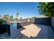 Swimming pool with custom desert landscaping in a serene backyard setting at 3824 W Carol Ave, Phoenix, AZ 85051