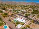 Aerial view of a home with a pool and play set in a lush, residential area at 3951 E Sequoia Trl, Phoenix, AZ 85044