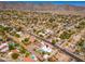 Expansive aerial view showcases the beautiful neighborhood with mountain views and blue skies at 3951 E Sequoia Trl, Phoenix, AZ 85044