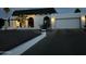 Elegant stucco home with a dark tile roof, desert landscaping, attached garage, and inviting curb appeal at 3951 E Sequoia Trl, Phoenix, AZ 85044