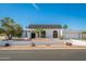 Beautiful home featuring a charming tiled roof, desert landscaping, and a private two-car garage at 3951 E Sequoia Trl, Phoenix, AZ 85044