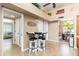 Open-concept kitchen with breakfast bar seating and warm, neutral tones at 3951 E Sequoia Trl, Phoenix, AZ 85044