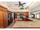 Updated kitchen with granite countertops, stainless steel refrigerator and open shelving at 3951 E Sequoia Trl, Phoenix, AZ 85044