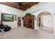 Large, airy living room with ceiling fan, high ceilings, and access to other areas of the home at 3951 E Sequoia Trl, Phoenix, AZ 85044