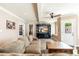 Spacious living room with a large entertainment center and comfortable sofa at 3951 E Sequoia Trl, Phoenix, AZ 85044