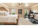 Bright main bedroom with a decorative bed frame and a ceiling fan at 3951 E Sequoia Trl, Phoenix, AZ 85044