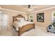 Inviting main bedroom with plush carpet, ceiling fan, and natural light at 3951 E Sequoia Trl, Phoenix, AZ 85044