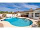 Inviting backyard pool with a covered patio, perfect for relaxation and entertaining under the Arizona sun at 3951 E Sequoia Trl, Phoenix, AZ 85044