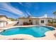 Beautiful backyard featuring a large swimming pool and a covered patio perfect for entertaining at 3951 E Sequoia Trl, Phoenix, AZ 85044