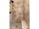 Custom tiled shower with built-in bench and diamond pattern walls at 3951 E Sequoia Trl, Phoenix, AZ 85044