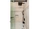 Elegant tiled shower with modern fixtures, including a rainfall showerhead and a built-in shelf at 3951 E Sequoia Trl, Phoenix, AZ 85044