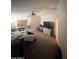 Spacious main bedroom with a carpeted floor and a ceiling fan at 40724 W Novak Ln, Maricopa, AZ 85138