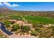 Aerial view showcasing the property, golf course, and surrounding desert landscape at 40853 N 94Th St, Scottsdale, AZ 85262