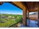 Scenic balcony view of a lush green golf course and desert landscape at 40853 N 94Th St, Scottsdale, AZ 85262
