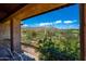Relaxing balcony with golf course view, beautiful Arizona landscape, and mountain backdrop at 40853 N 94Th St, Scottsdale, AZ 85262