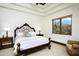 Comfortable bedroom with large window and scenic views, offering a peaceful retreat with wood accents at 40853 N 94Th St, Scottsdale, AZ 85262