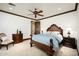 Comfortable bedroom with elegant furnishings and wood accents, creating a cozy and inviting ambiance at 40853 N 94Th St, Scottsdale, AZ 85262