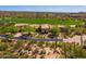 A home with desert landscaping situated near a golf course, offering a serene and picturesque setting at 40853 N 94Th St, Scottsdale, AZ 85262