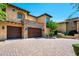 Spacious two-car garage, stone accents, and a well-maintained driveway at 40853 N 94Th St, Scottsdale, AZ 85262