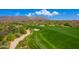 Expansive golf course view with lush green fairways, well-manicured greens, and scenic surroundings at 40853 N 94Th St, Scottsdale, AZ 85262