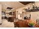Gourmet kitchen featuring custom cabinetry, granite countertops, and stainless steel appliances at 40853 N 94Th St, Scottsdale, AZ 85262