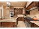Gourmet kitchen with stainless steel appliances, custom cabinets and granite countertops at 40853 N 94Th St, Scottsdale, AZ 85262