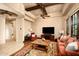 Comfortable living room with a ceiling fan, desert views, and an open floor plan at 40853 N 94Th St, Scottsdale, AZ 85262