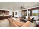 Comfortable living room with a wet bar and scenic views of the desert landscape at 40853 N 94Th St, Scottsdale, AZ 85262