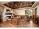 Home office features a brick fireplace, beautiful wood trim, and scenic views at 40853 N 94Th St, Scottsdale, AZ 85262