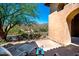 Cozy outdoor lounge area with comfortable chairs, complemented by a scenic desert view at 40853 N 94Th St, Scottsdale, AZ 85262