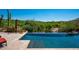 Inviting outdoor pool with relaxing views of the adjacent golf course at 40853 N 94Th St, Scottsdale, AZ 85262