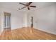 Spacious bedroom with hardwood floors and a ceiling fan at 4354 N 82Nd St # 178, Scottsdale, AZ 85251