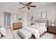 Bright bedroom featuring a ceiling fan, neutral decor, and ample natural light at 4354 N 82Nd St # 178, Scottsdale, AZ 85251