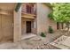 Welcoming condo entrance with decorative stone, mature trees, and easy access to amenities at 4354 N 82Nd St # 178, Scottsdale, AZ 85251