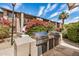 Outdoor grilling area with dual stainless steel grills and counter space, ideal for entertaining guests at 4354 N 82Nd St # 178, Scottsdale, AZ 85251