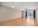 Open-concept living area with brick wall and sliding glass doors providing ample natural light at 4354 N 82Nd St # 178, Scottsdale, AZ 85251