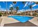 Sparkling community pool surrounded by palm trees and lounge chairs for ultimate relaxation at 4354 N 82Nd St # 178, Scottsdale, AZ 85251