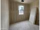 Bedroom with a bright window, drywall, and concrete floors, ready for finishing at 46886 W Coe St, Maricopa, AZ 85139