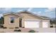 Inviting single-story home with a three-car garage and low-maintenance desert landscaping at 46886 W Coe St, Maricopa, AZ 85139