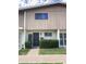 Exterior shot of home entrance featuring secure front door, trimmed bushes and a small, manicured lawn at 5425 N Black Cyn Hwy, Phoenix, AZ 85015