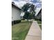 Well-maintained community grounds featuring sidewalks, lush lawns, and mature trees at 5425 N Black Cyn Hwy, Phoenix, AZ 85015