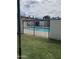 Community pool area enclosed with a fence, and some lounge seating visible at 5425 N Black Cyn Hwy, Phoenix, AZ 85015