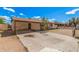 Expansive concrete backyard featuring a covered patio, perfect for outdoor entertaining and relaxation at 5529 W Virginia Ave, Phoenix, AZ 85035